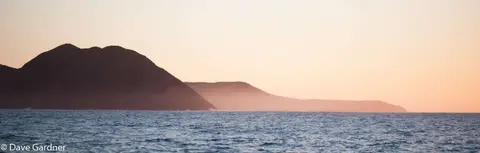 Pre-Dawn Light over Recherche Bay. Dawn broke as we left Recherche Bay for Port Davey.