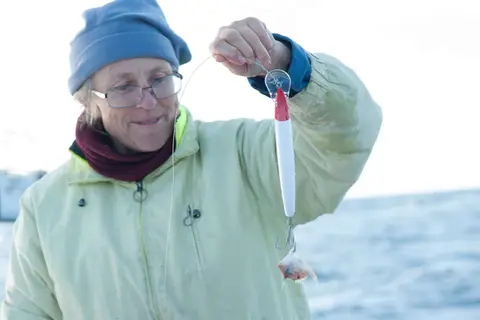 Disappointment. How did such a small fish manage to get hooked on such a big lure?