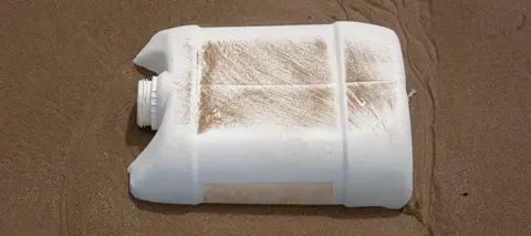 Beach Debri,. One plastic container had contained Triclopyr herbicide.