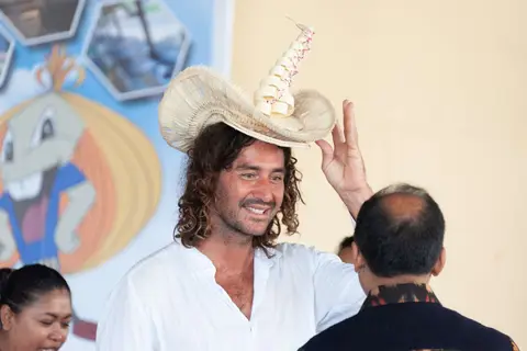 Another hat-wearer.