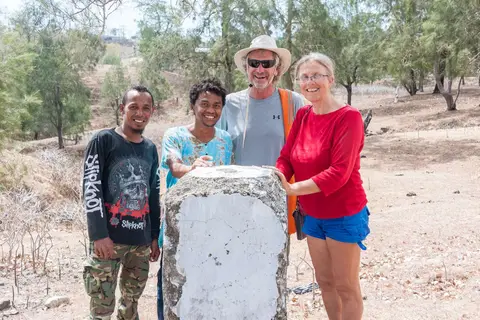 Indonesian - Timor-Leste Border. Our guides are in Indonesia; Lesley and I are in Oecusse, Timor-Leste.