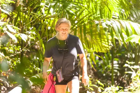 Lesley walking up the valley to the falls.