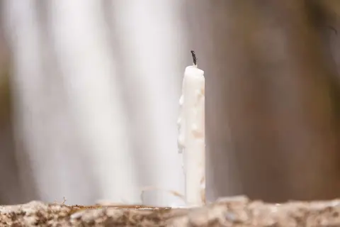 Candle at the Falls.