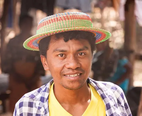 Antonio. Antonio, our guide to Oecusse, wearing a traditional hat.