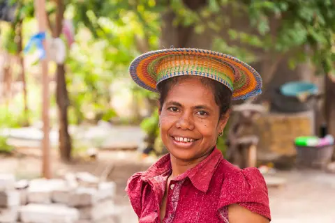 Oecusse Woman's Hat.. Of Portuguese inspiration, these hats look wonderful! They are woven from local materials.