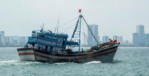 Vietnamese Fishing Boat.. They are beautiful boats with rakish style!