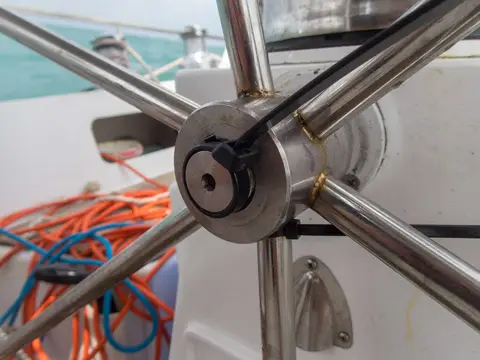 Cable ties have all sorts of uses.. When the nut holding the wheel fell off and was lost, I came up with this solution.