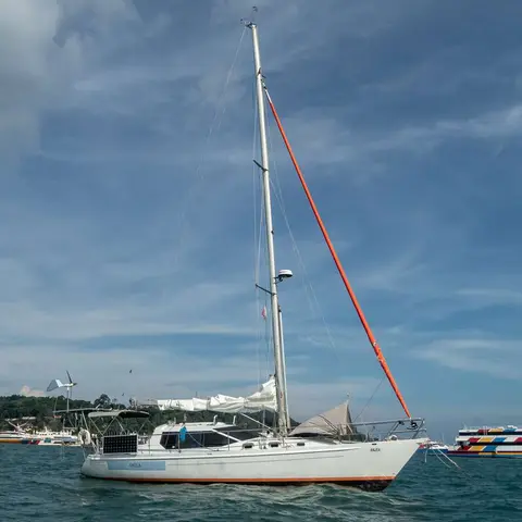 Anjea. New livery -- orange genoa and boot-top look great.