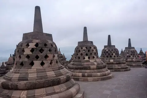 Borobudur Upper Level. Each stupa encloses a statue of Buddha