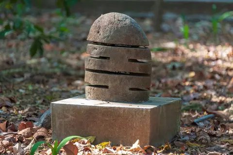 Stone Sculpture in Hutan Kota Malabar. Just this isolated piece. No other sculpture in the forest.