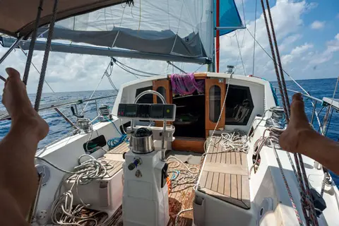 The Office. I take the wheel off when underway. The autopilot steers Anjea reliably for days on end.