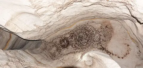 Bat Patterns. The caves are full of bats that create these weird patterns on the ceiling.