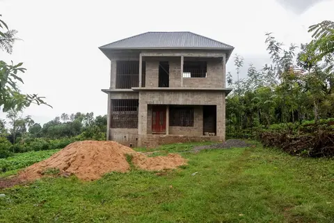 Under Construction. Houses take many years to build as money and resources are found.