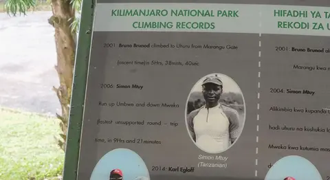 Our Host. Simon is our host at Mbahe Farm. His record has since been broken by younger runners he helped train.