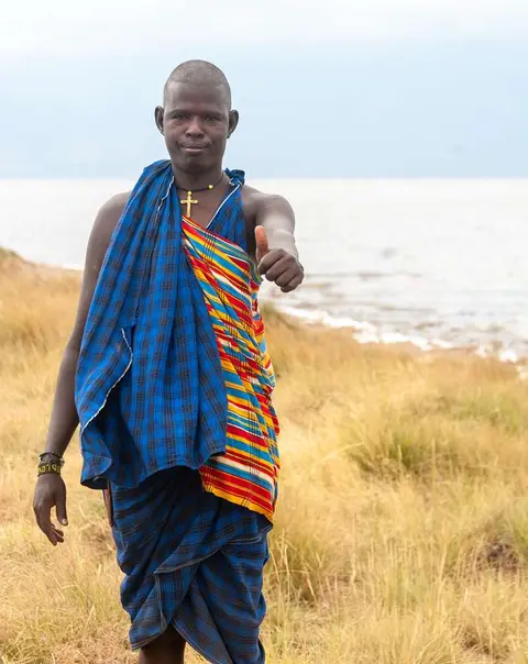 Maasai Guide. This man guided us through a trackless wilderness of grass and acacia to the flamingo nesting site.
