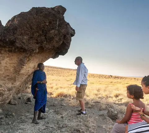 Wilson and Rock. Wilson explains that the rock was used for protection.