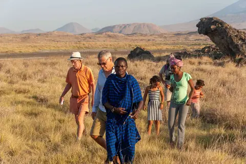 Sundowners. Wilson leads us to the spring, our sundowner destination for today.