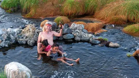 Arthur, Malaika and Marina. Cooling off in the spring.