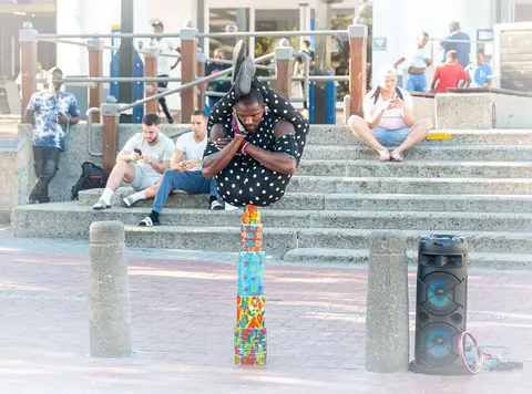 Contortionist. Dancer, yogi, contortionist, this guy was amazing.