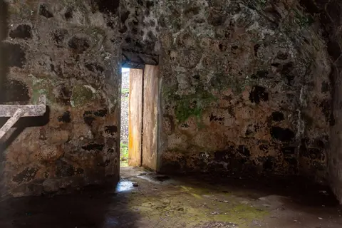 Inside the Fort. Solid stone walls without windows.