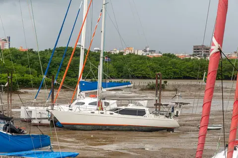 Stuck in the mud. When the 7m tide goes out Anjea sinks into the soft mud.