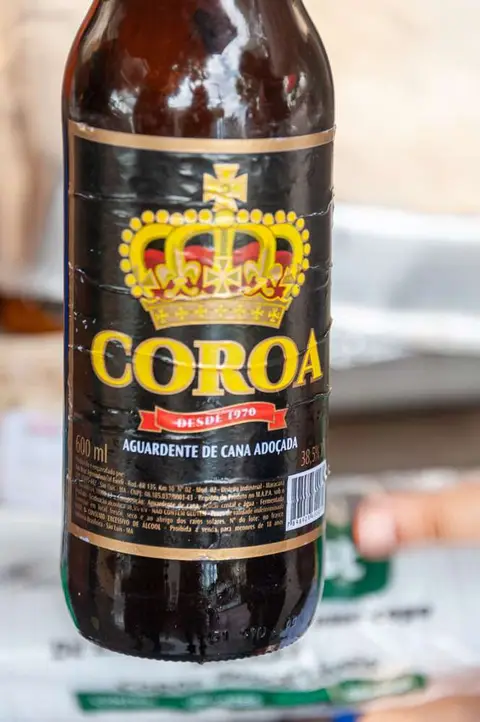 The essential juice. The dancers and musicians are lubricated with a home-brew version of this.