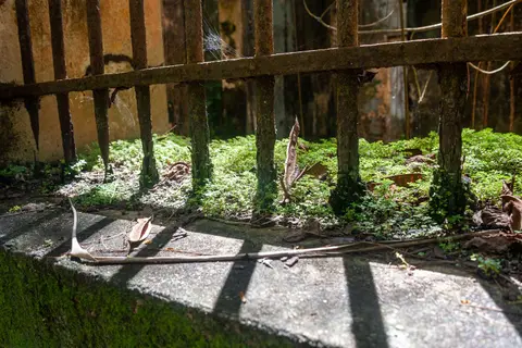 Crumbling Bars. The whole island is slowly eliminating the signs of its past.