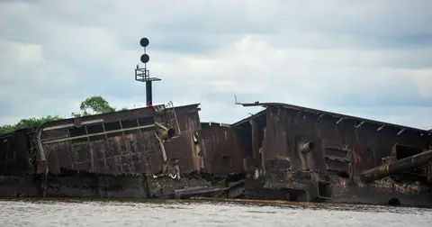 Wrecks are strewn all over the Suriname River. The irony is that isolated danger mark. The wreck is far more visible than the navigation marker!