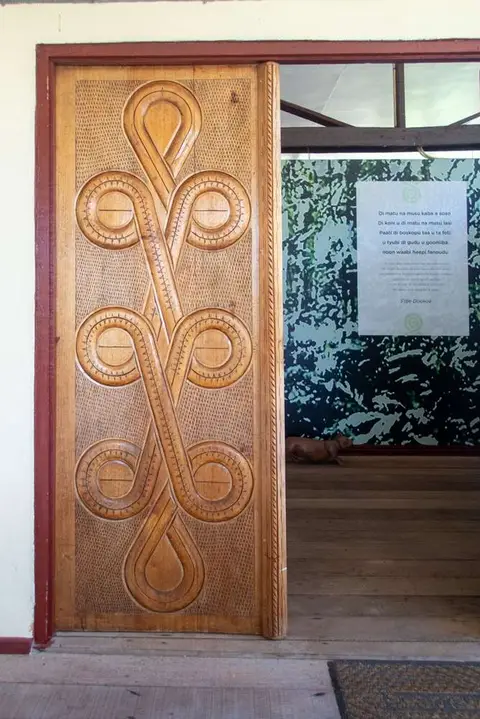 The entrance to the Saamaka Museum.. Beautiful, intricately carved entrance doors.