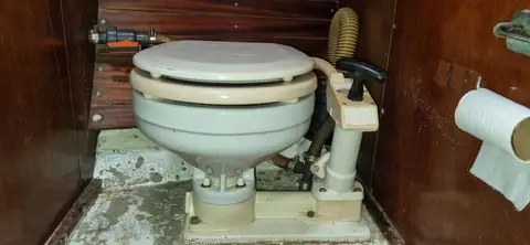 Broken Toilet. But I fixed it.