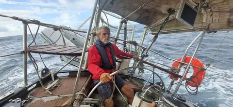 Yayo at the Helm. Bollemaat is a dream to steer, even in heavy weather. Her big, transom-hung rudder and balanced sail-plan make her one of the nicest boats I have ever helmed.