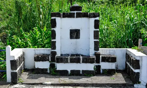 Water Tap. On an island where streams, waterfalls and lakes are everywhere, we find a public water tap set in an elaborate stone and concrete monument.