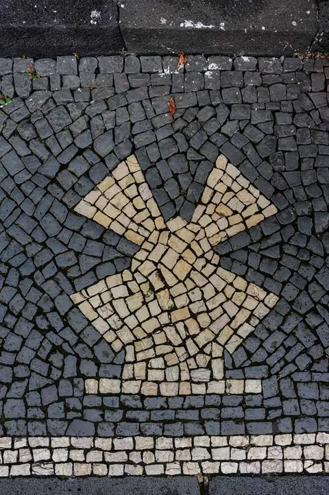 Windmill Motif. Pavement designs depict many different aspects of Azorean history.
