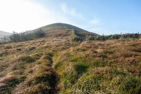 Late afternoon. Near the top of Castlequin