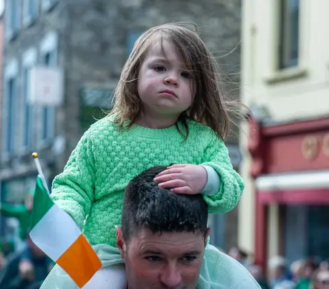Misery. Even a shoulder-ride isn't enough for some.