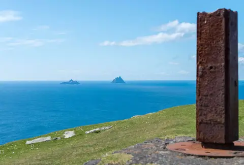 The Skelligs. With the remains of the Bray Head flagpole .