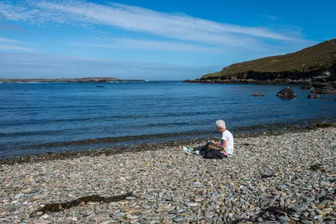 Helen Gathering Pebbles