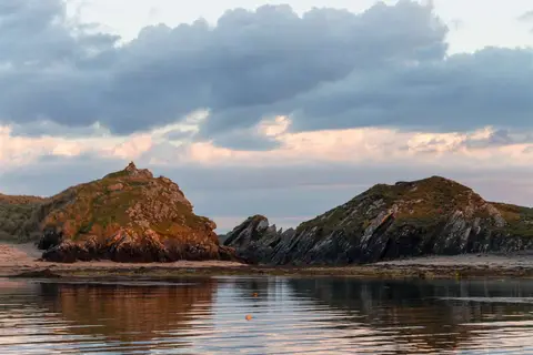 Light on Rocks. View from our mooring in Inishbofin harbour