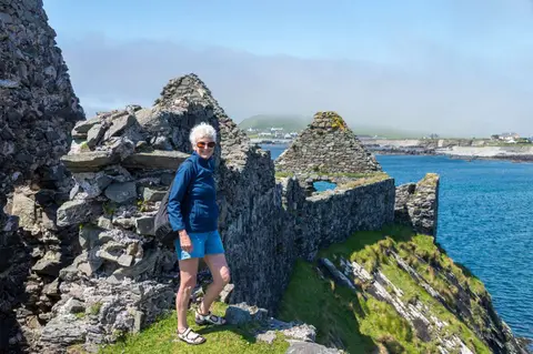 Helen on Inishbofin. The ruins are of Cromwell's Fort, which he captured from Grace O'Malley and the pirate Don Bosco in the 16th C.