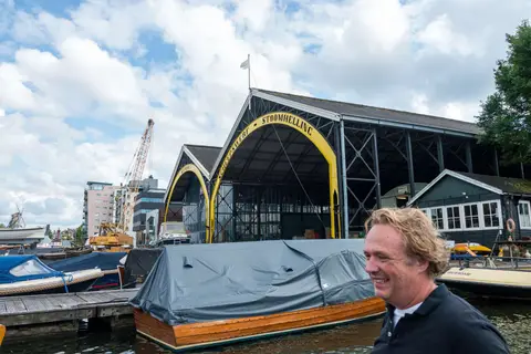 Scheepswerf. Marnix in front of the shipyard