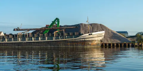 Morning Light. The big canals have many working boats carrying everything imaginable.