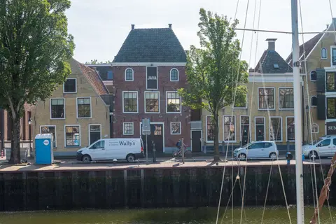 Java. Many houses are named for the place their builder traded.